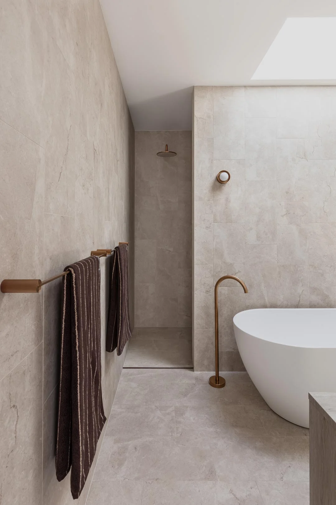 brushed-copper-tapware-neutral-bathroom-freestanding-bath