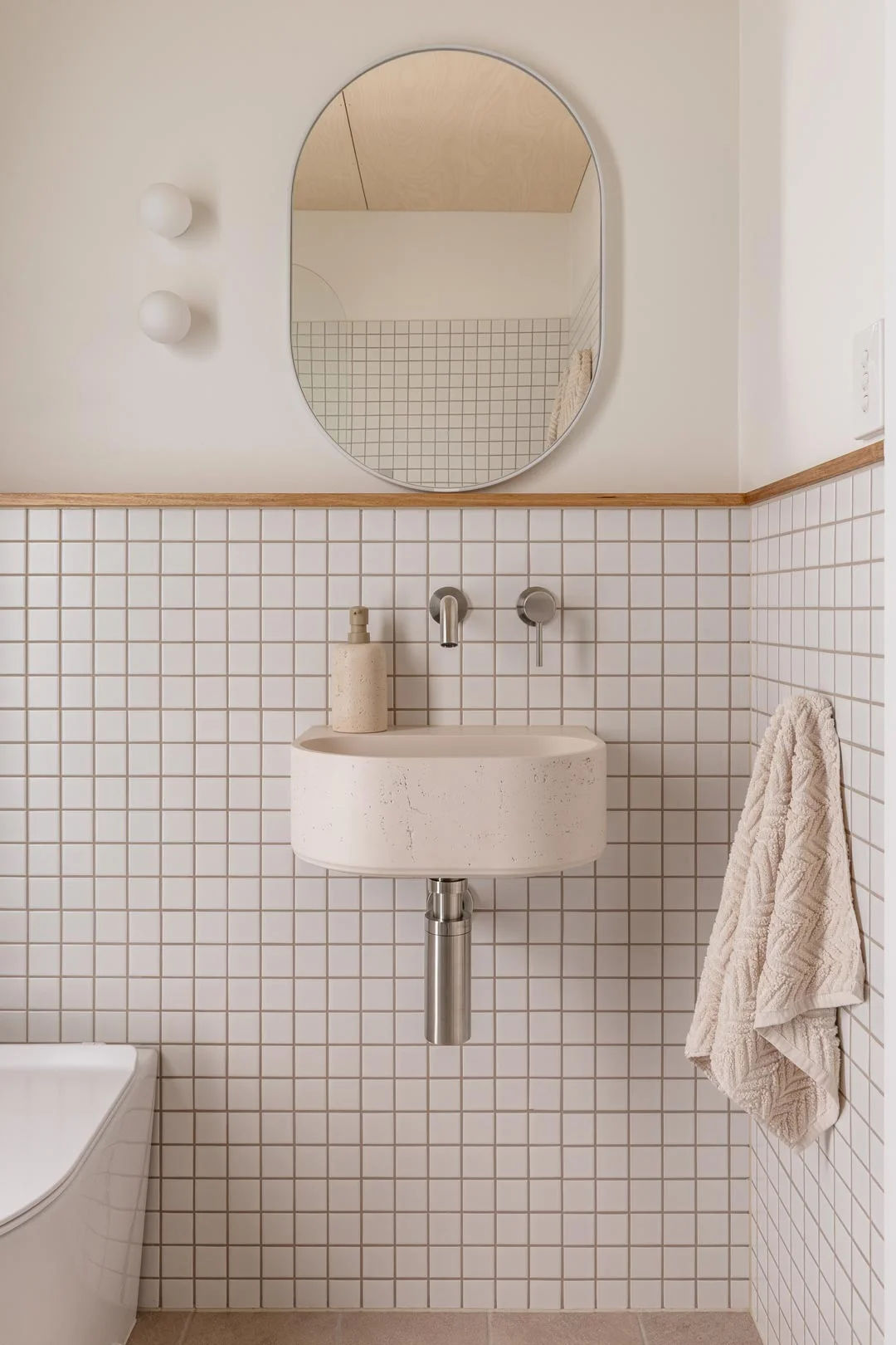 concrete-basin-wall-mount-with-brushed-nickel-tapware-square-mosaic-tiles-tiny-bathroom