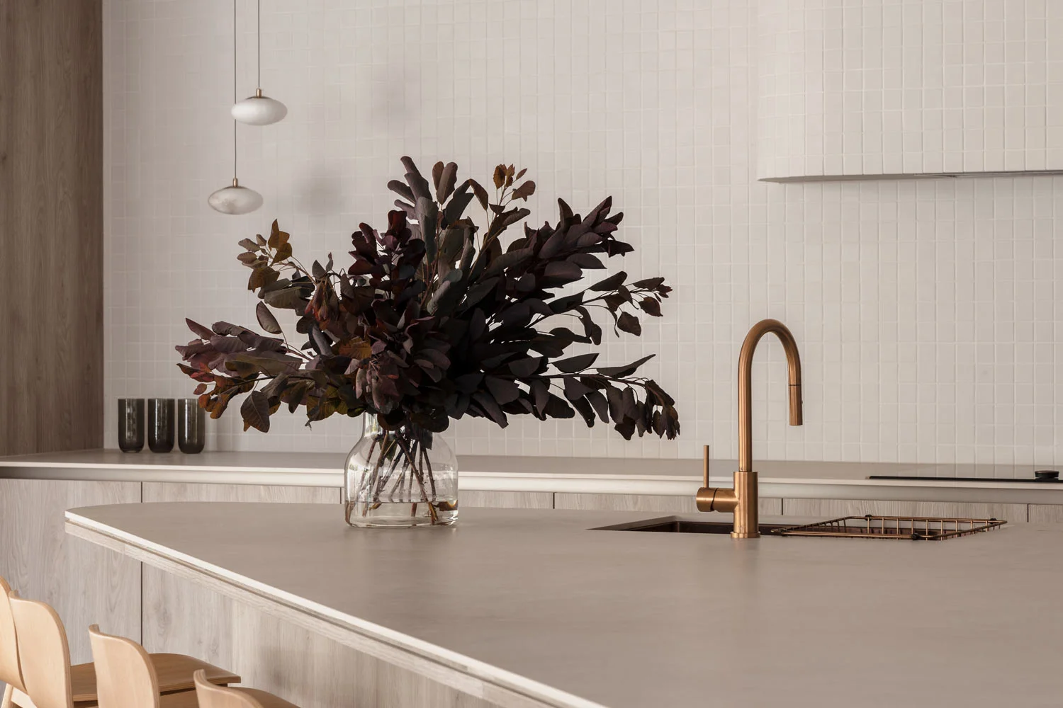 Luxury-Modern-Kitchen-Design-Brushed-Copper-Kitchen-Tap-White-Square-Splashback-Grey-Benchtops