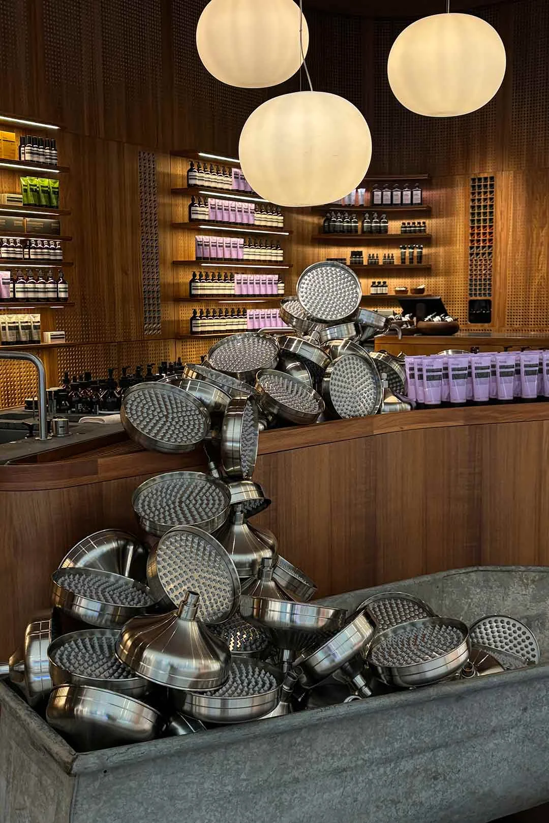 Aesop-Chrome-Shower-Head-Shop-Display