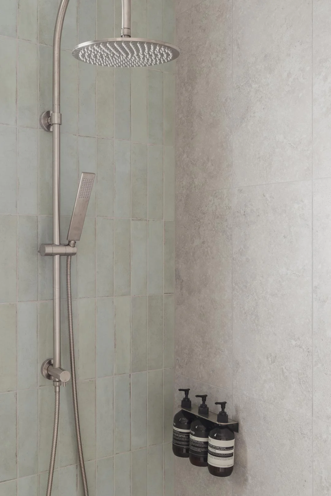 brushed-nickel-shower-set-green-zelige-subway-tiles-in-luxe-shower