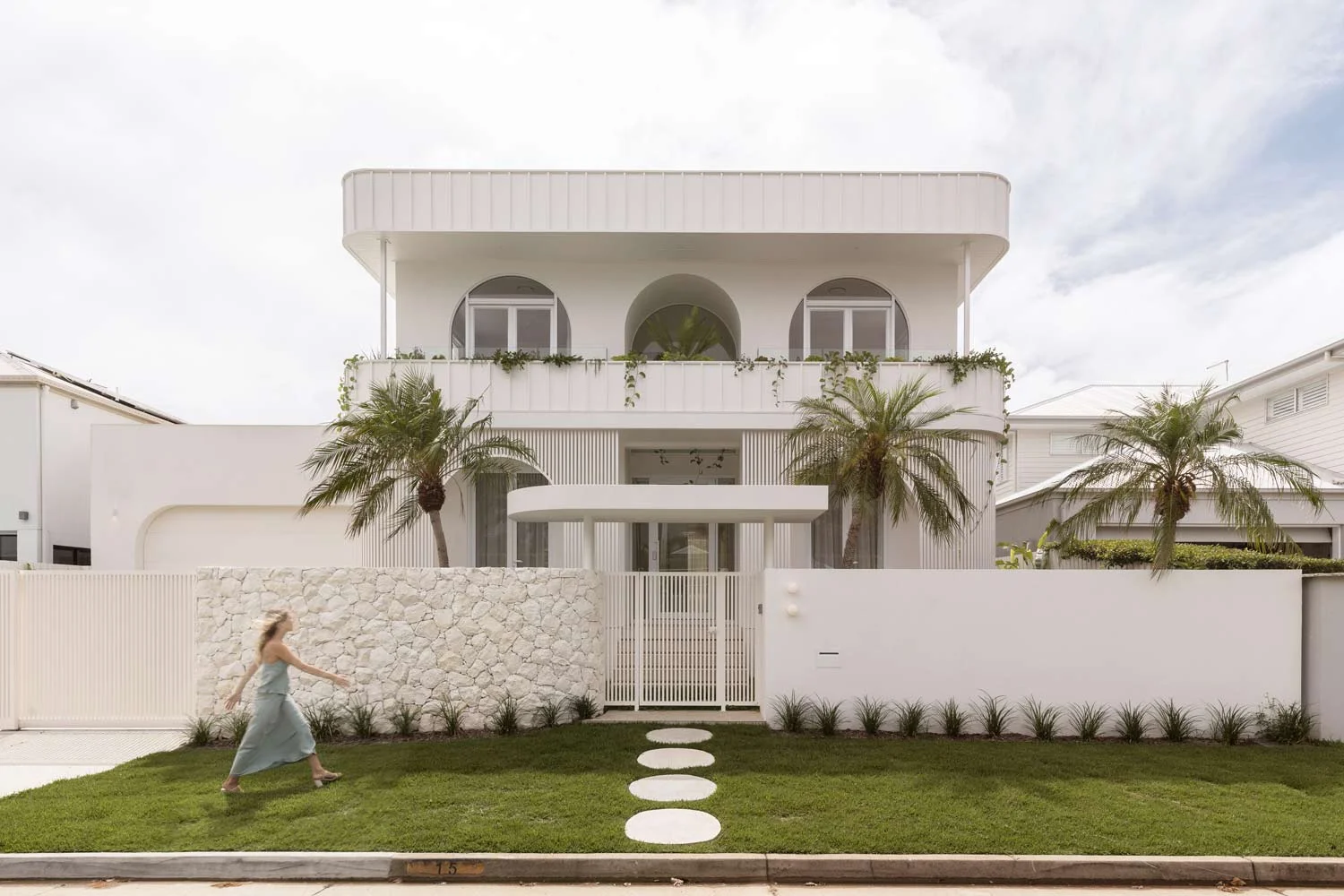 Gold-Coast-Home-Villa-Pearl-White-Exterior-Arches