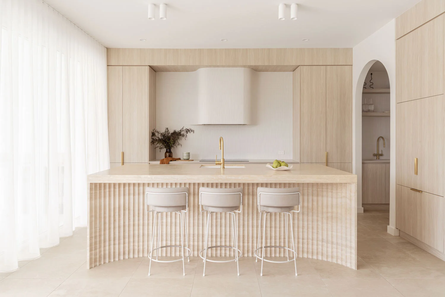 Gold-Coast-Home-Mediterranean-Kitchen-Travertine-Island