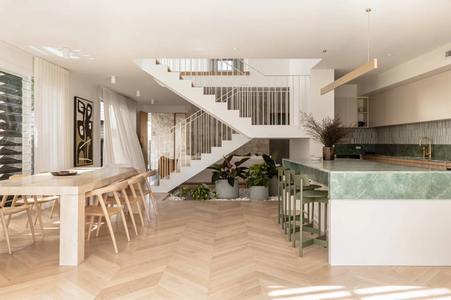 Happy-Haus-Modern-Interior-Design-Open-Plan-Living-Kitchen-Dining-Brushed-Brass-Tapware-Herringbone-Floorboards-Brazillian-Emerald-Quartzite-Benchtops