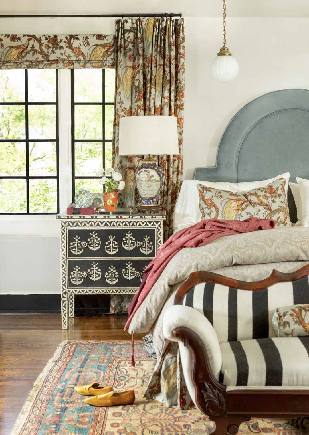 An eclectic hipstoric bedroom with layered textures