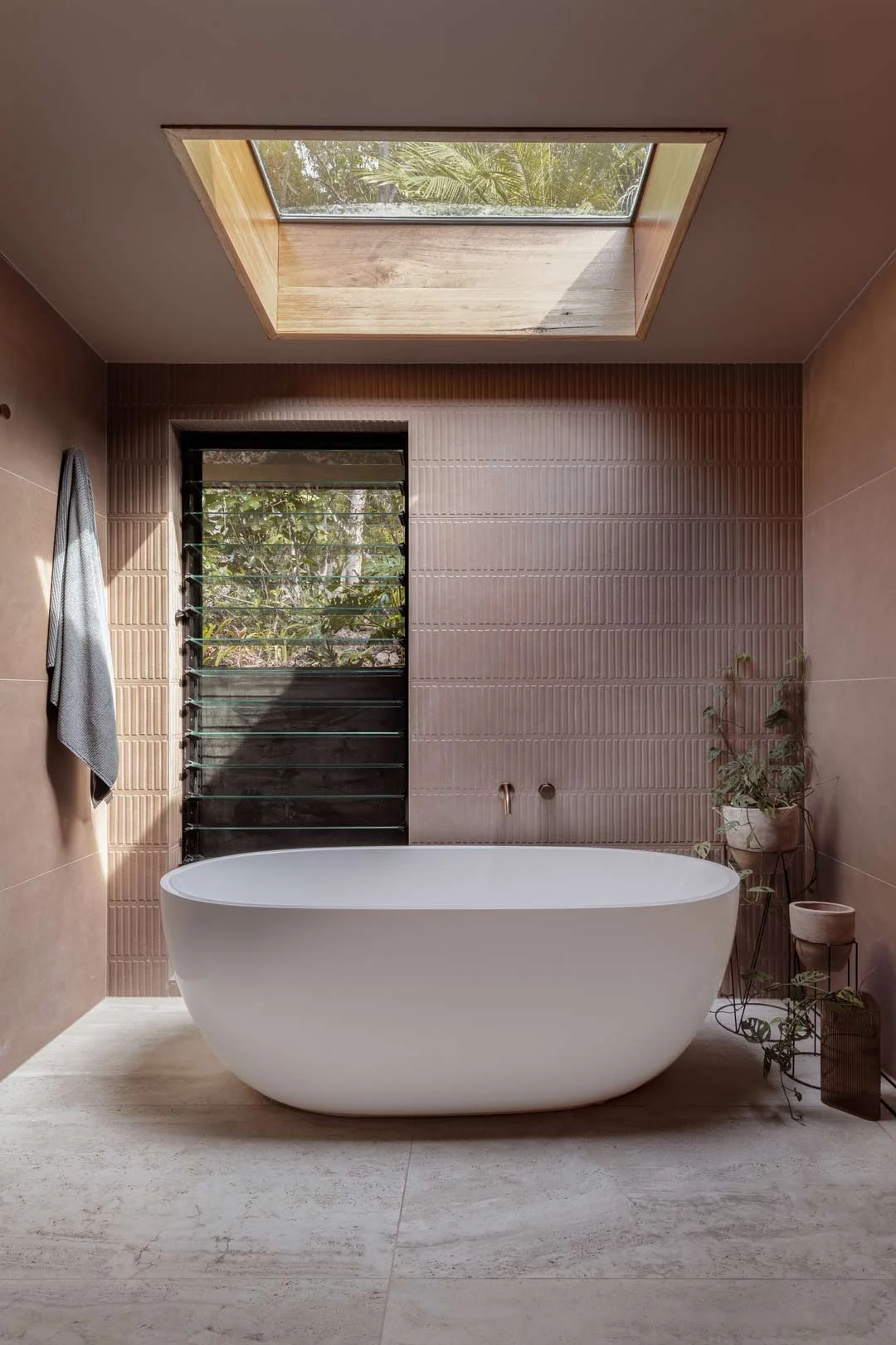 bathroom tile design trends Biophillic bath skylight stone floor