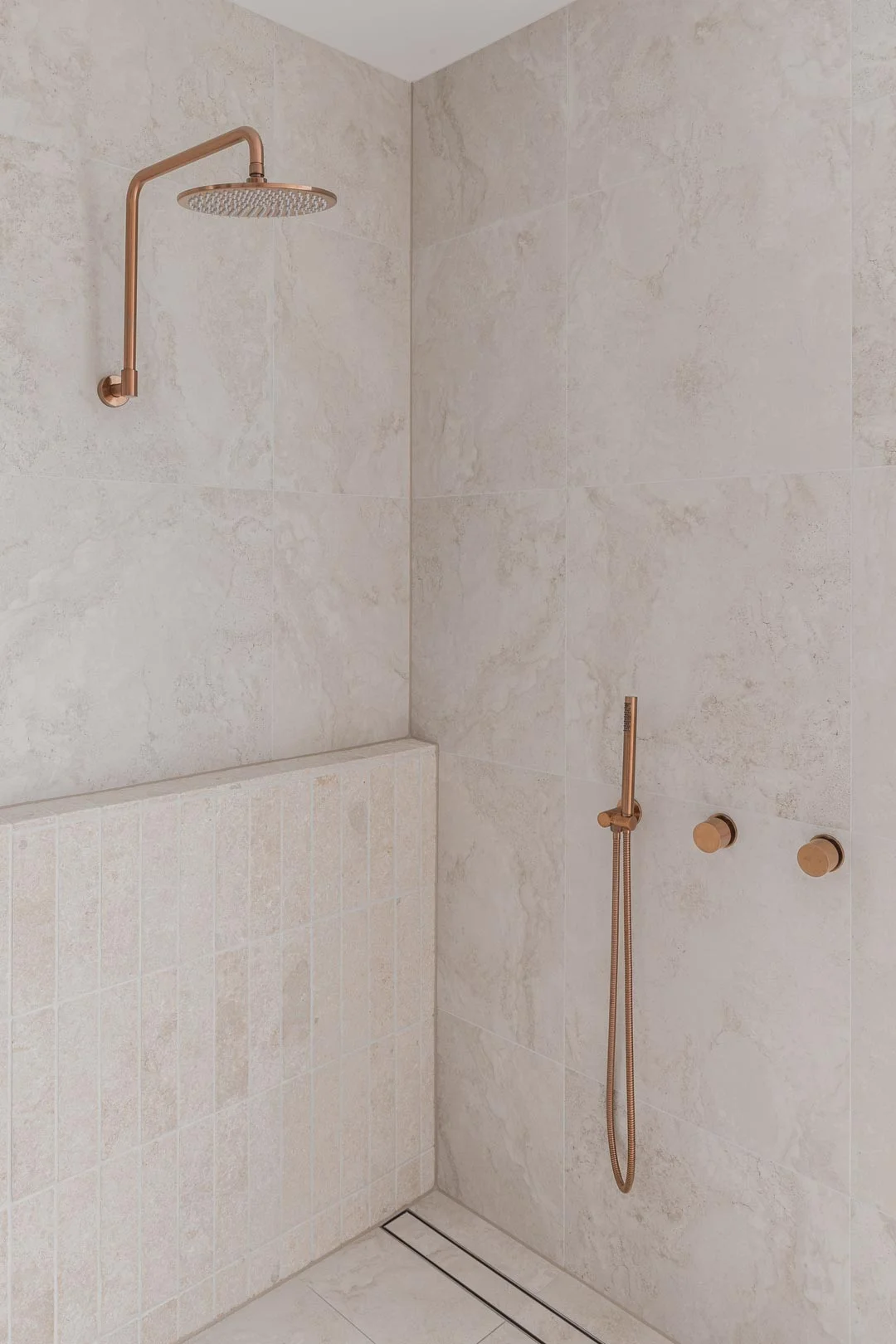 bathroom-tile-designs-brushed-copper-tapware-neutral-shower