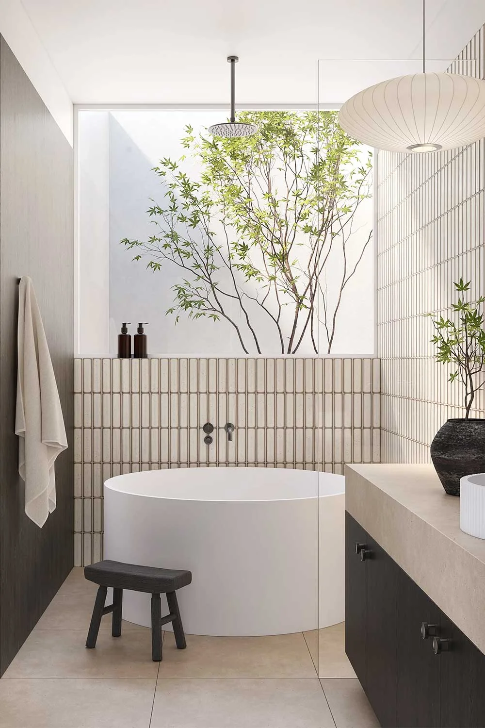 Japandi-Style-Bathroom-Round-Bath-Dark-Cabinetry-Neutral-Tiles