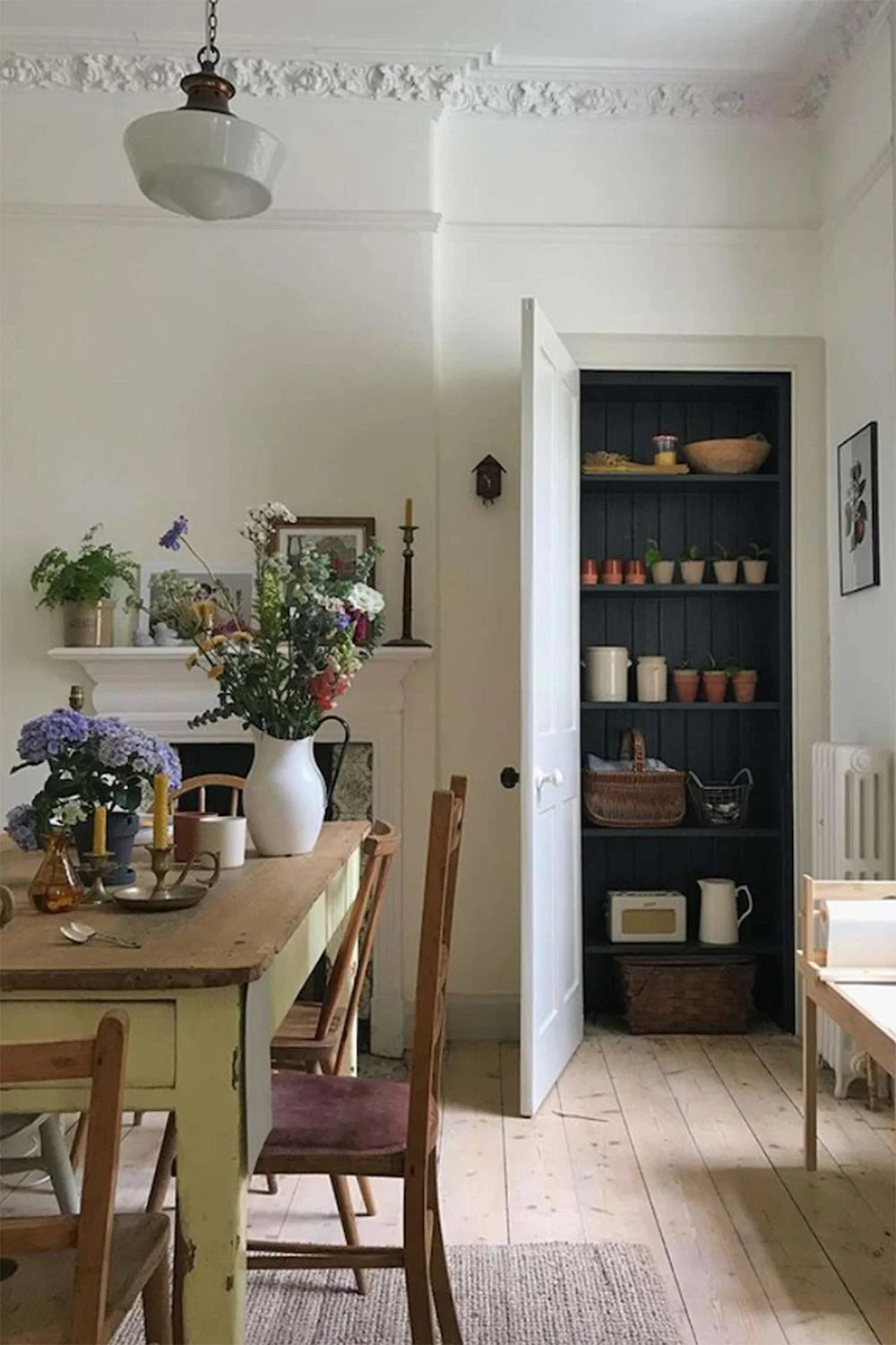 Cottagecore-Dining-Room-Fireplace-Navy-Shelving