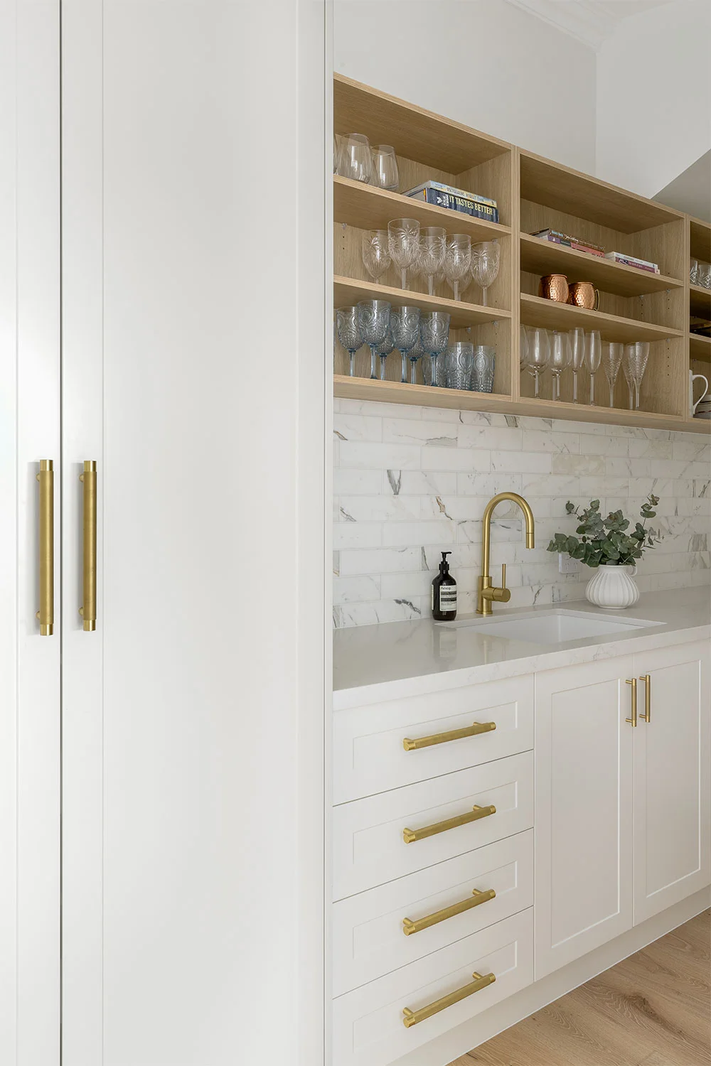 Shaker-Style-Kitchen-Pantry-White-Cabinetry-Marble-Countertops-Oak-Open-Shelving