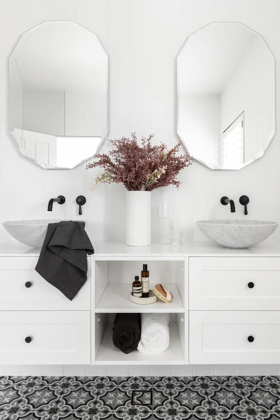 Matte Black provincial tapware paired with marble basin and a double vanity