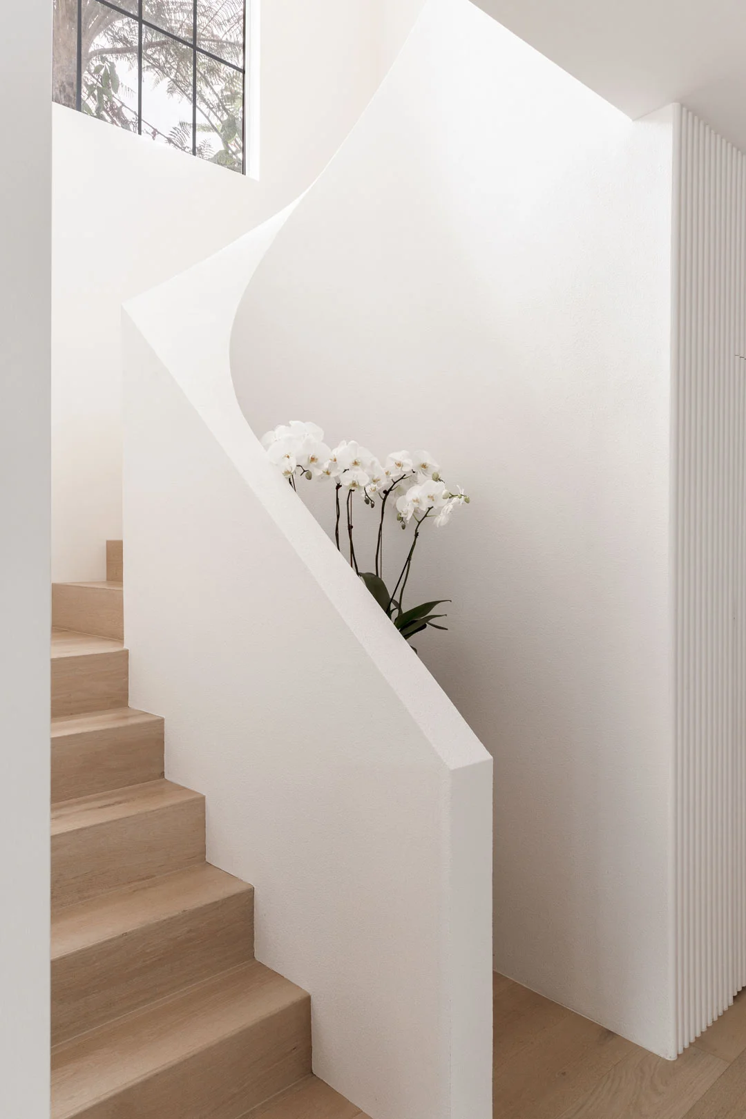 modern-hamptons-textured-render-spiral-stair-case