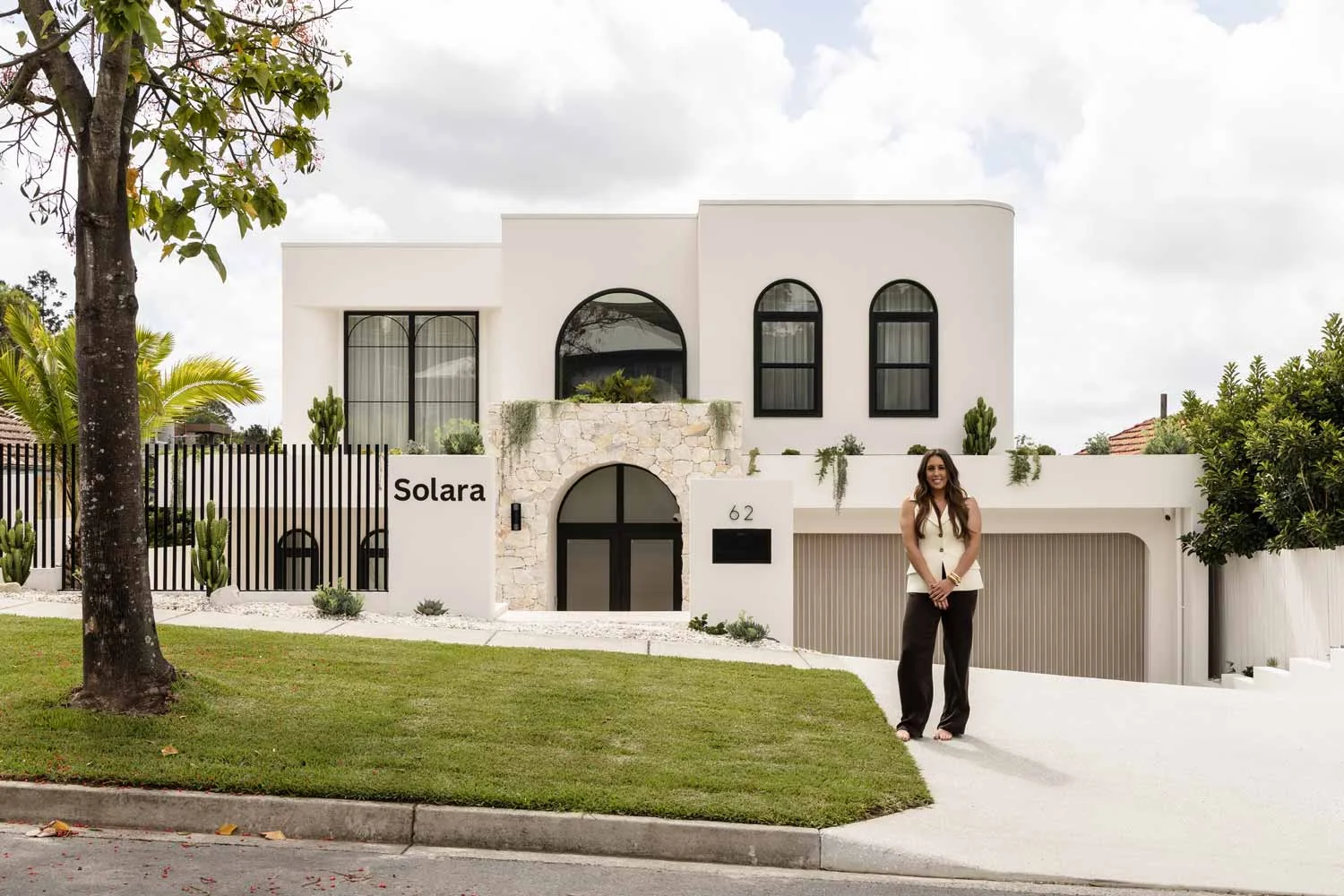 Sage and cove solara modern mediterranean architecture white arch exterior
