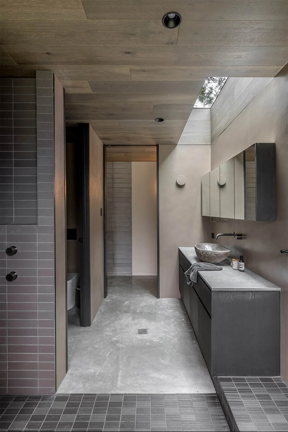 Japandi-Style-Bathroom-Dark-Feature-Tiles-Concrete-Brushed-Gunmetal-Tapware