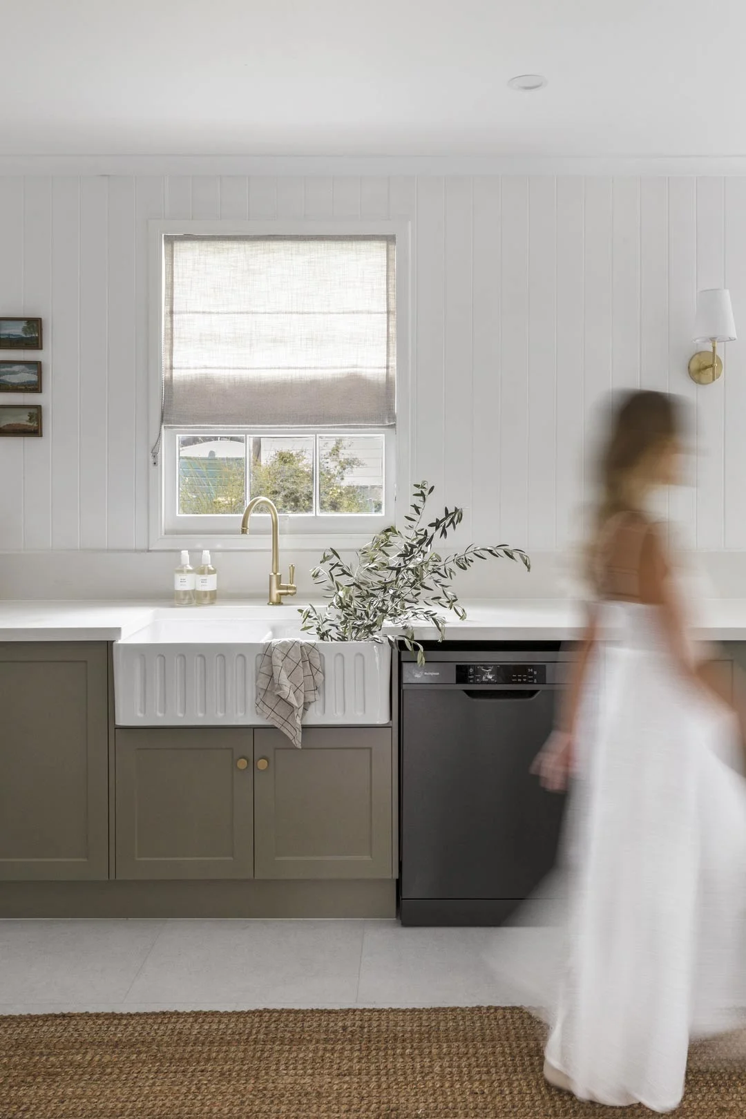 White-farmhouse-kitchen-sink -Green-cabinetry-kithcen