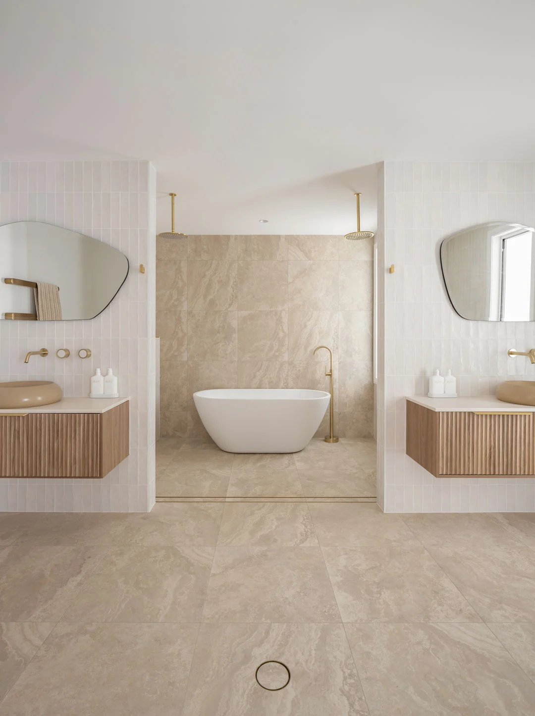 A-modern-coastal-bathroom-with-brushed-brass-designed-by-Andy-and-Deb-from-the-Block