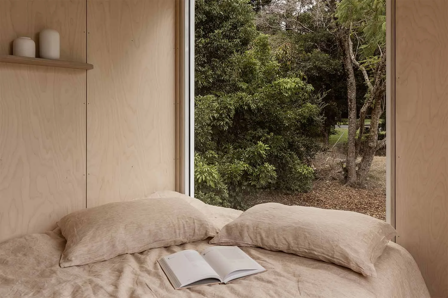 Organic-Modern-Interior-Design-Bedroom-Tiny-Home-Floor-Ceiling-Window-Nature