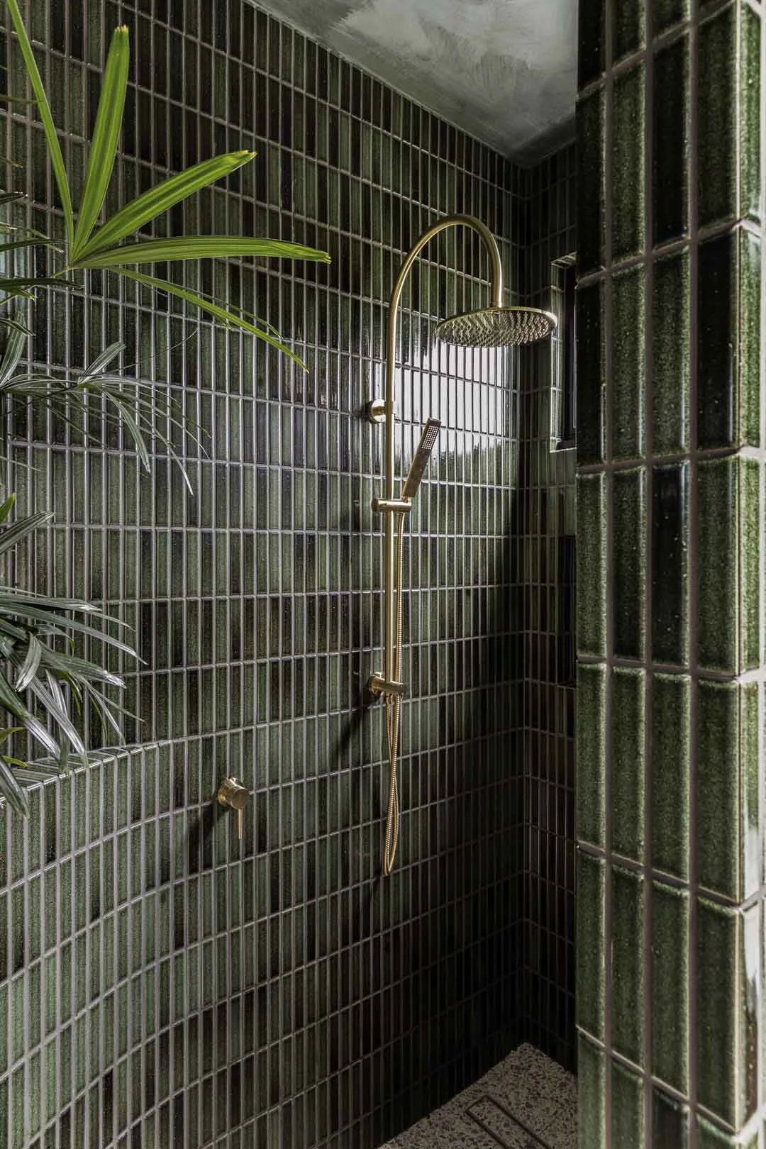 brushed-brass-tapware-Dark-green-Tiled-shower