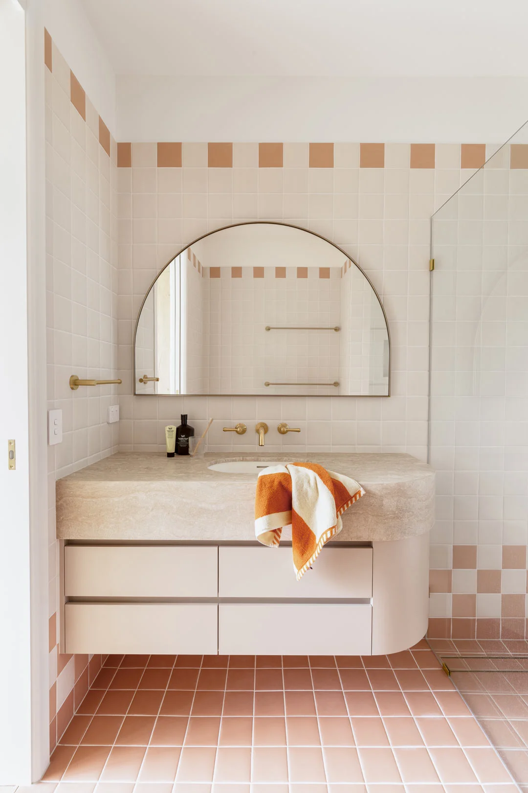pastel-pink-and-orange-theme-bathroom-with-brushed-brass-provincial-tapware