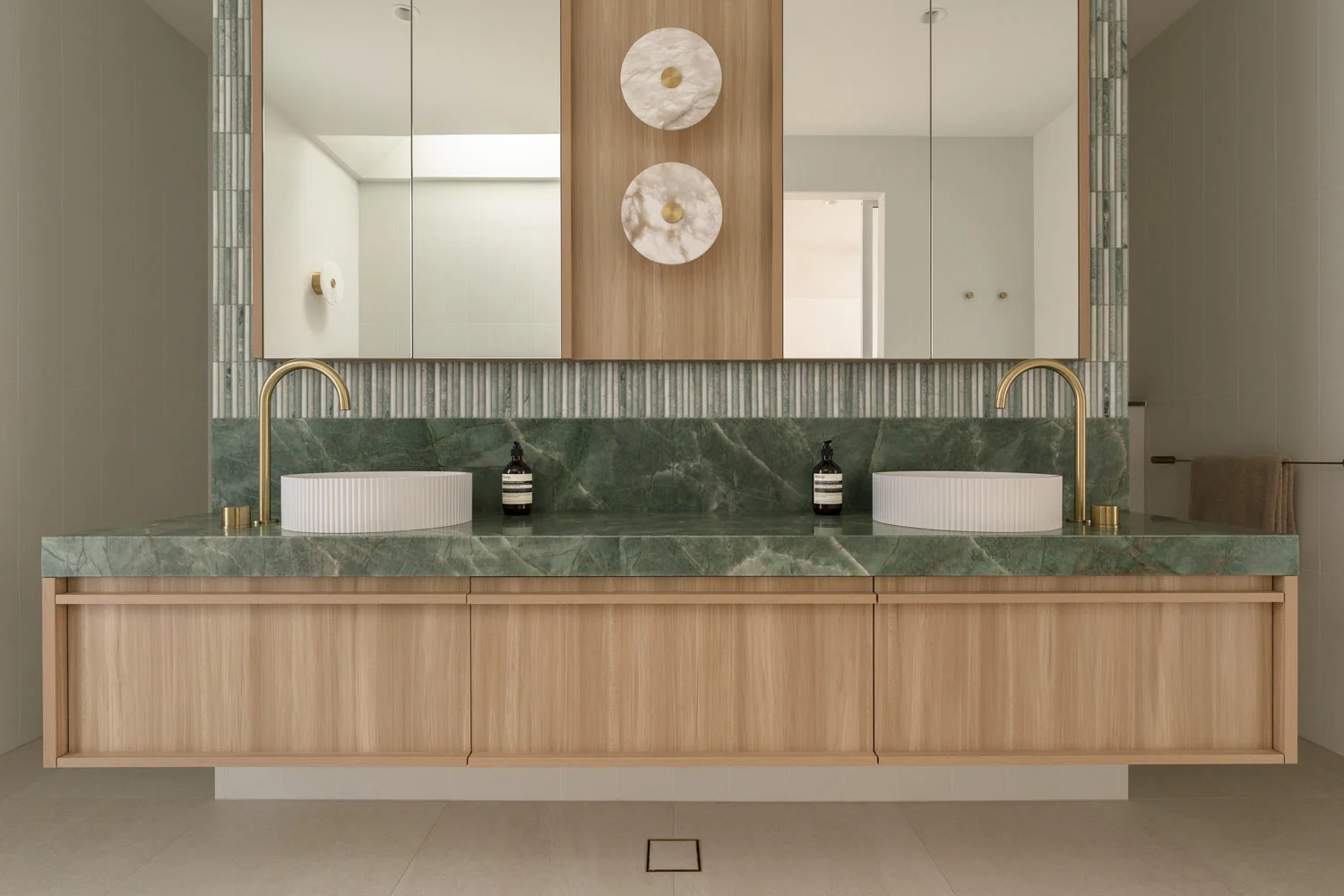 Happy-Haus-Modern-Interior-Design-Brushed-Brass-Tapware-Double-Oak-Vanity-Brazillian-Emerald-Quartzite-Bathroom