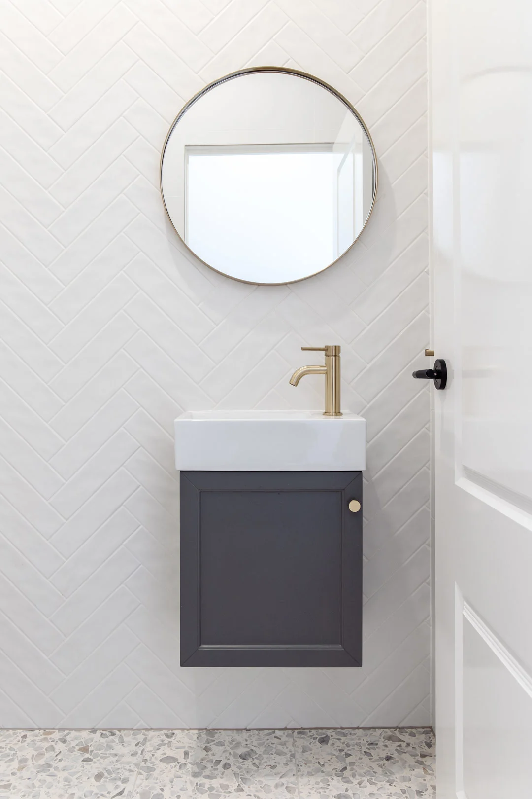bathroom-vanity-vs-cabinet-in-small-modern-powder-room