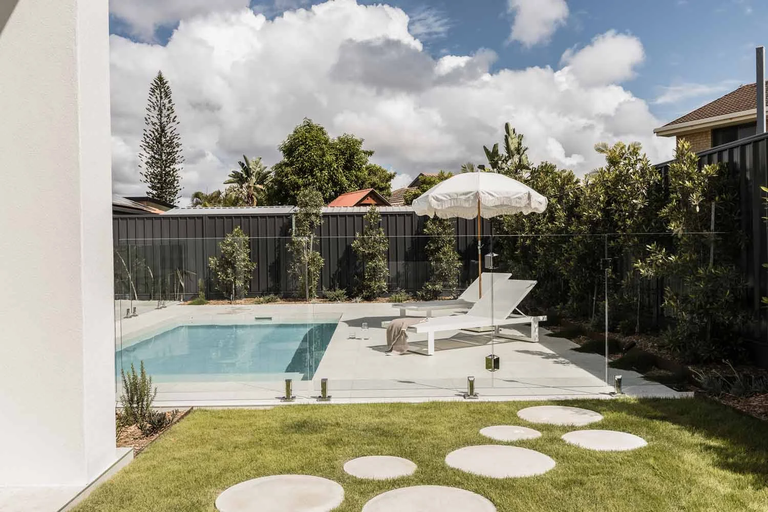 outdoor-living-spaces-with-pool-and-pavers