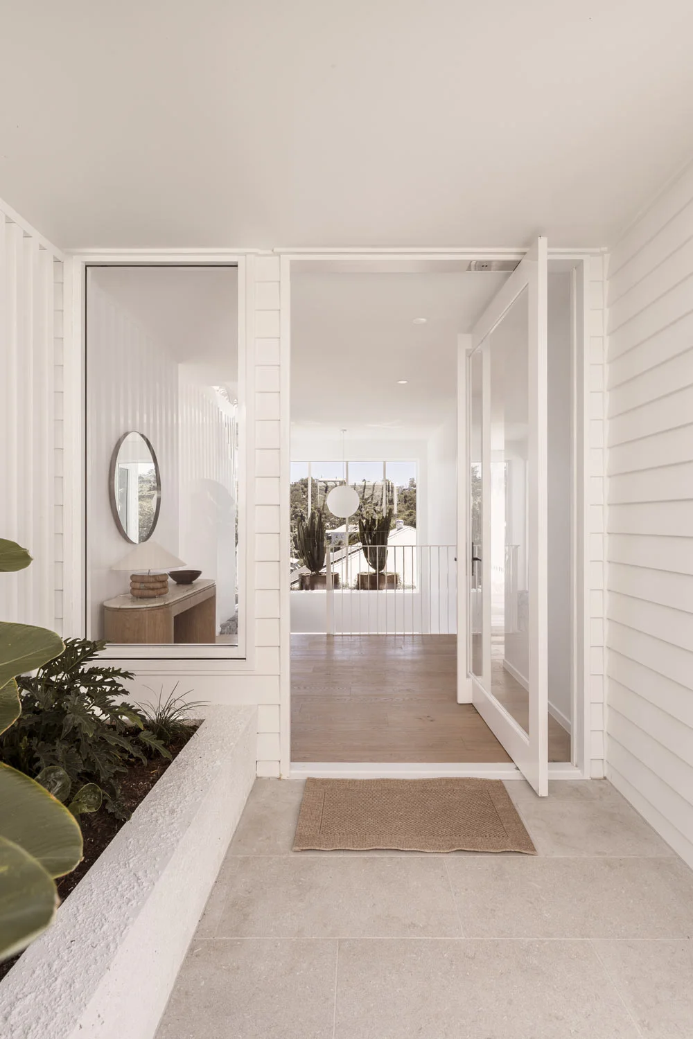 Contemporary-Interior-Design-Entry-Way-Glass-Front-Door-Coastal