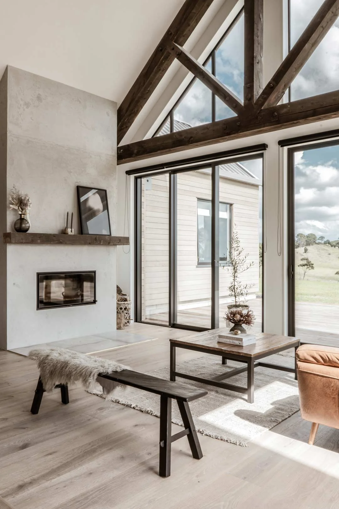 farmhouse-modern-interior-rustic-beams-over-living-area