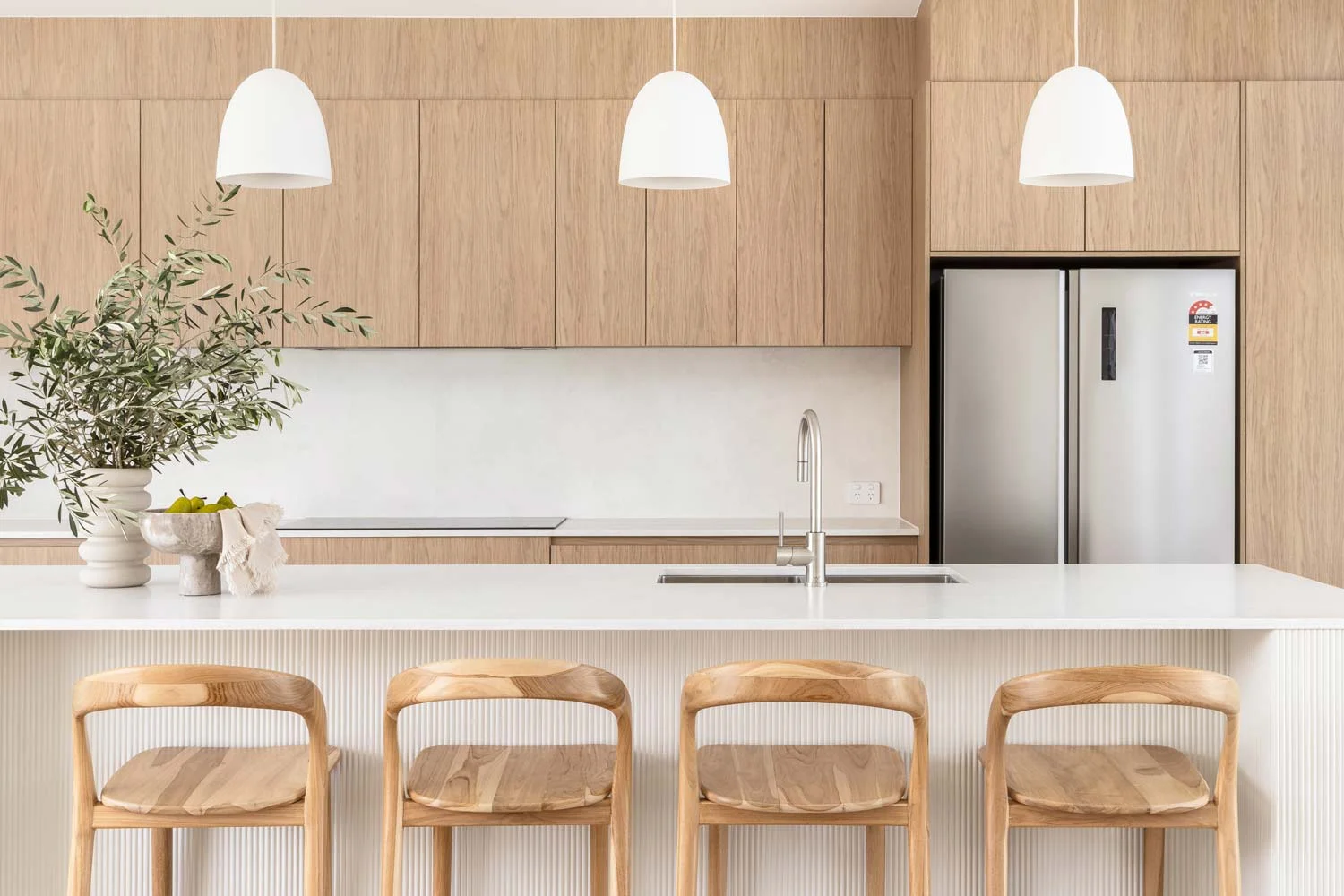Modern-Coastal-Interior-Design-beach-kitchen-with-wood-cabinetry