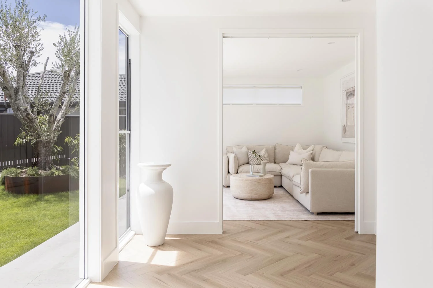 Modern-Beach-House-neutral-living-herringbone-flooring