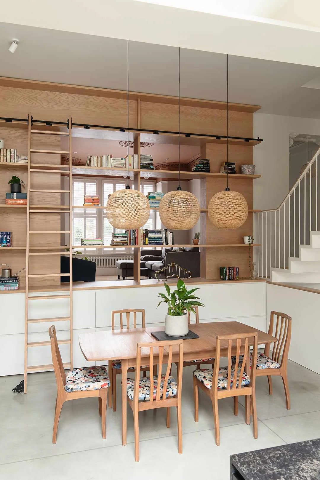 modern-victorian-house-wood-shelving-wall-dining-space