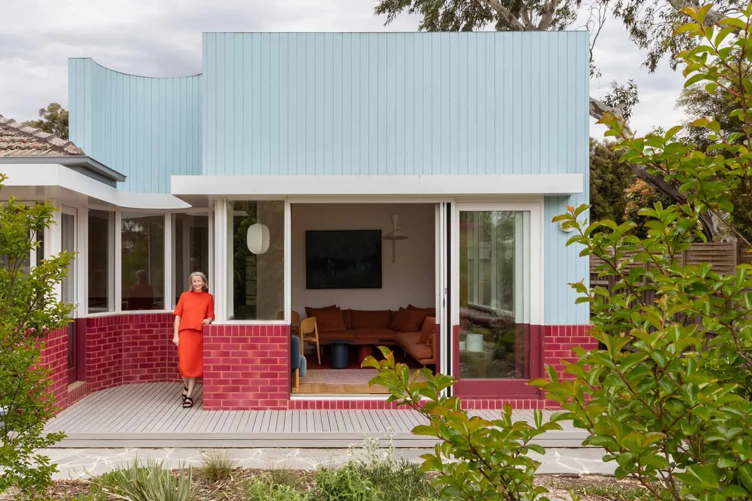 A pale blue and magenta colourful modern art deco home in Melbourne